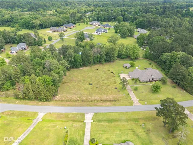 a view of swimming pool with a yard