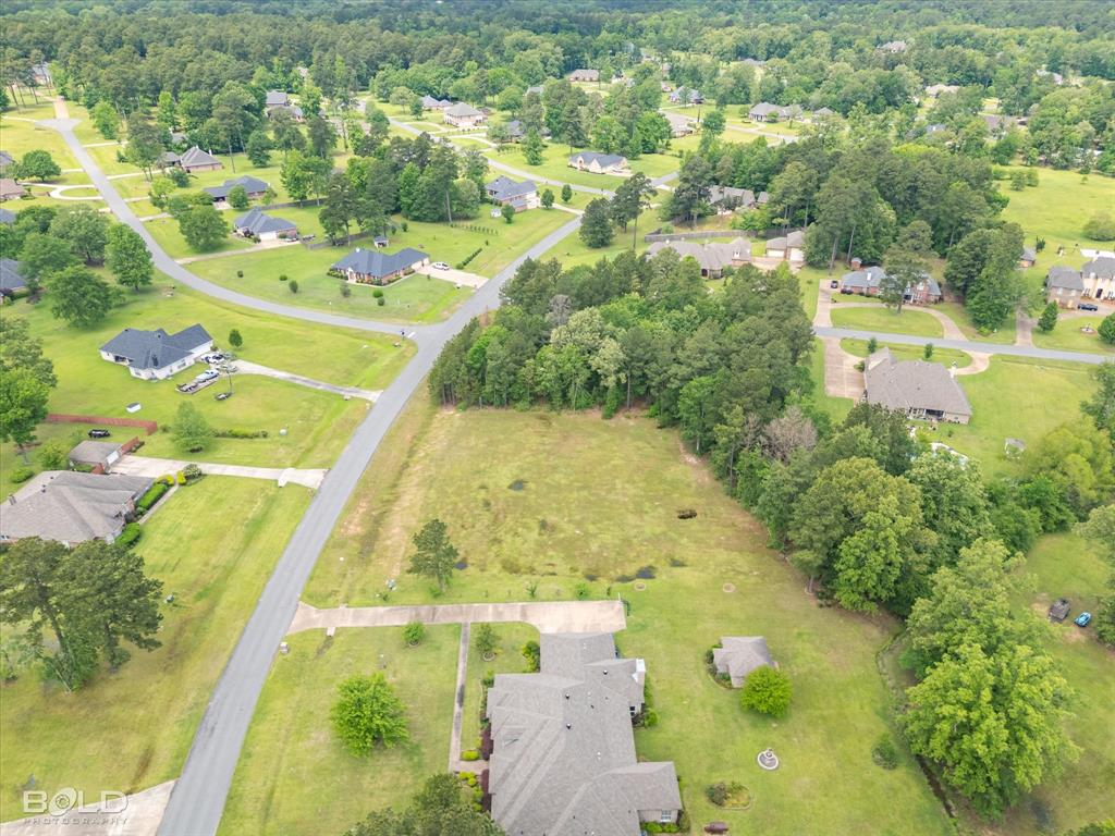 0 Fountainbleau Road Keithville, LA 71047 - Photo 4 of 12 a view of a swimming pool with a yard