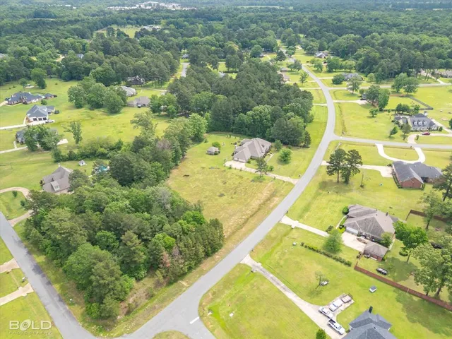 a view of swimming pool with a yard