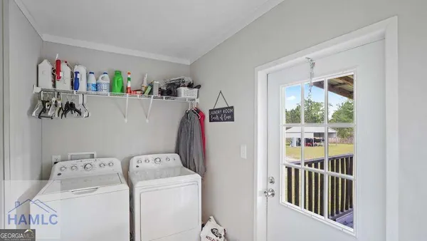 a bedroom with a bed and dresser