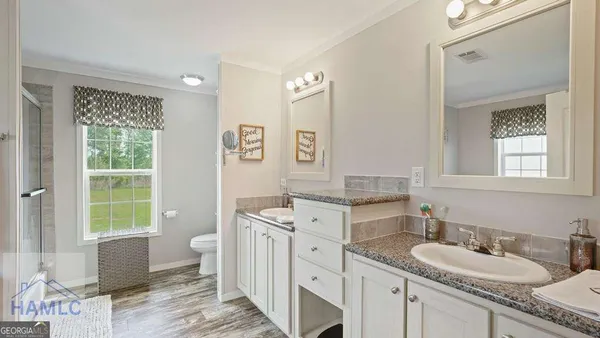 a white bath tub sitting next to a window