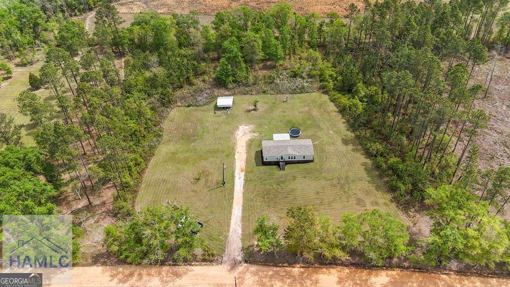 876 Hires Road Jesup, GA 31545 - Photo 4 of 30 a view of a city