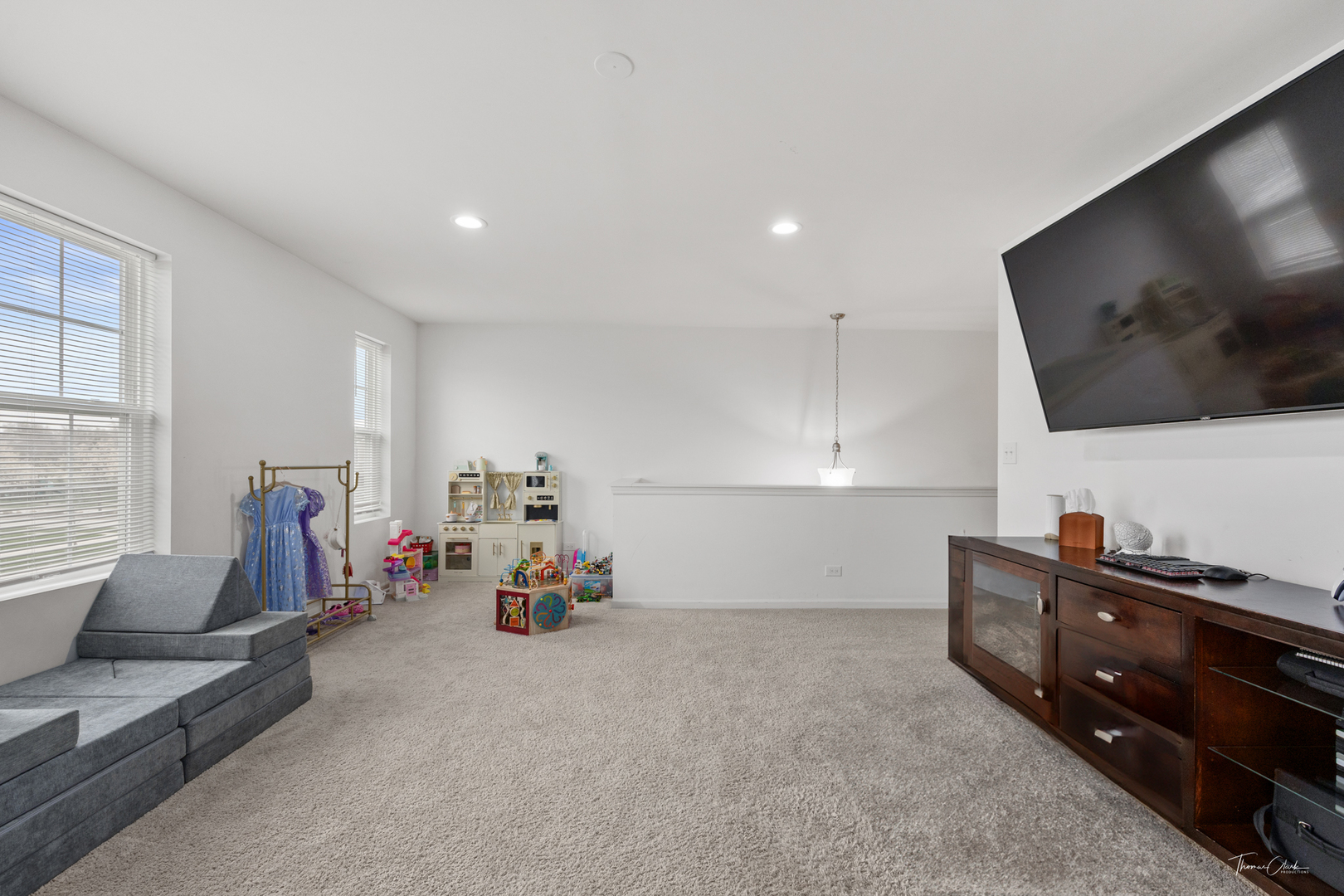 1978 Stapleton Road New Lenox, IL 60451 - Photo 28 of 47 a view of a room with gym equipment and a flat screen tv