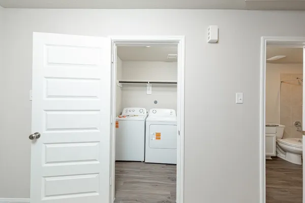 a bathroom with a toilet and a sink