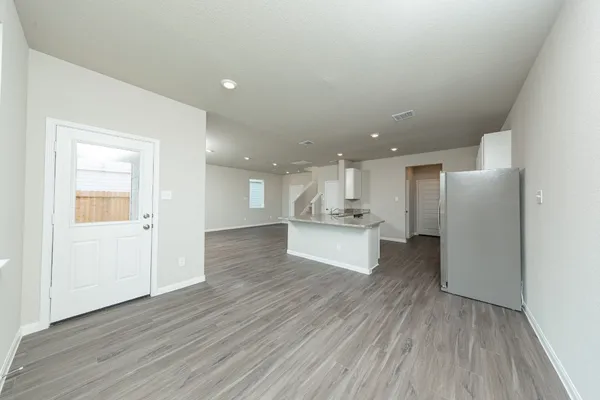 a view of kitchen view with wooden floor