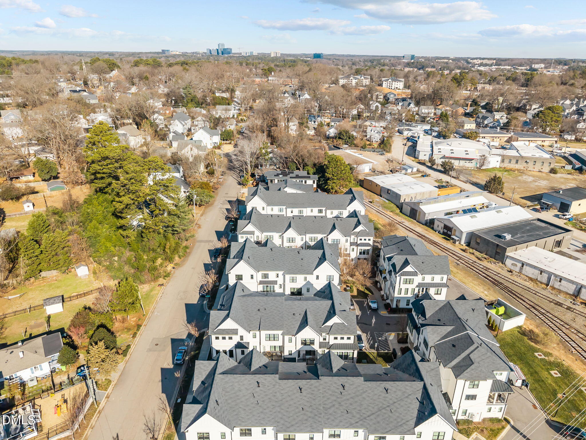 401 Bryan Pointe Drive, Unit 103 Raleigh, NC 27608 - Photo 48 of 57 11-web-or-mls-DJI_20260112105400_0325_D