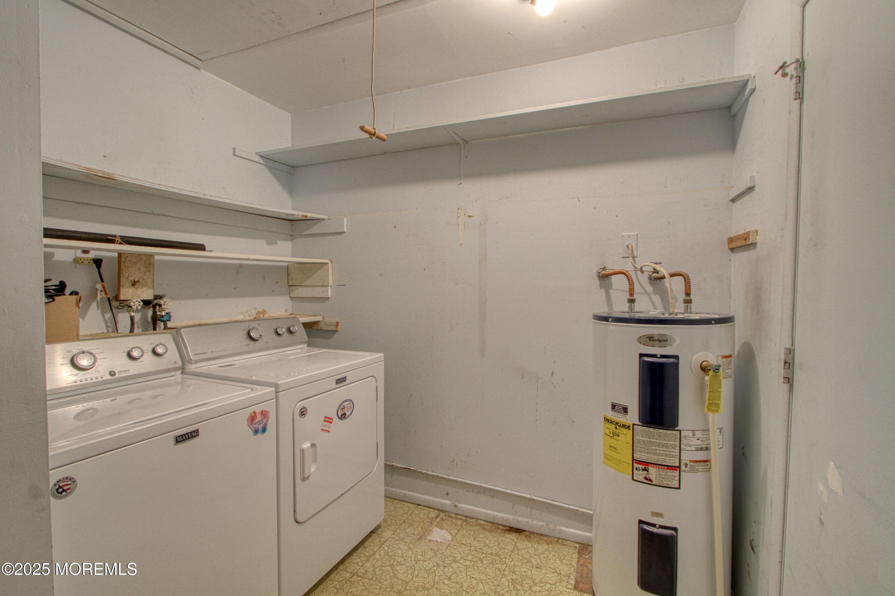 18 Moccasin Drive, Unit D Whiting, NJ 08759 - Photo 12 of 15 a utility room with dryer and washer