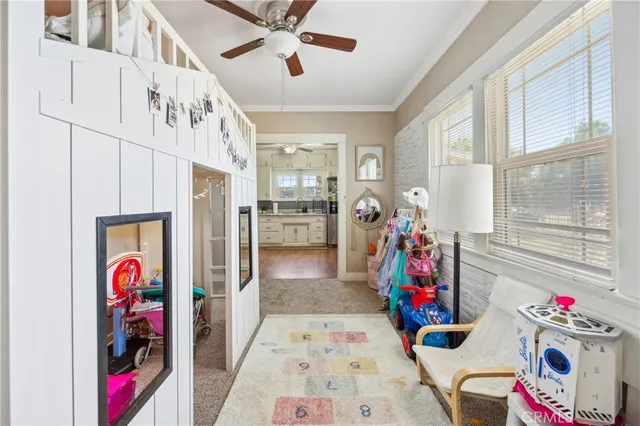 a bedroom with a bed and a chair