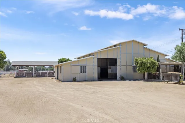 a view of a house with a snow in the yard
