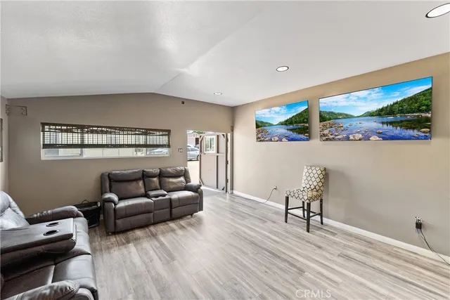 a room with furniture and a wooden floor