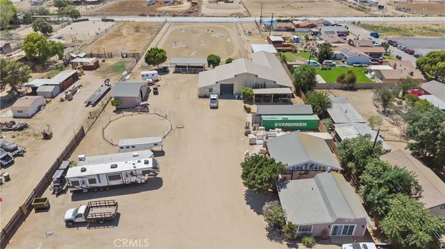 an aerial view of a residential houses with city view