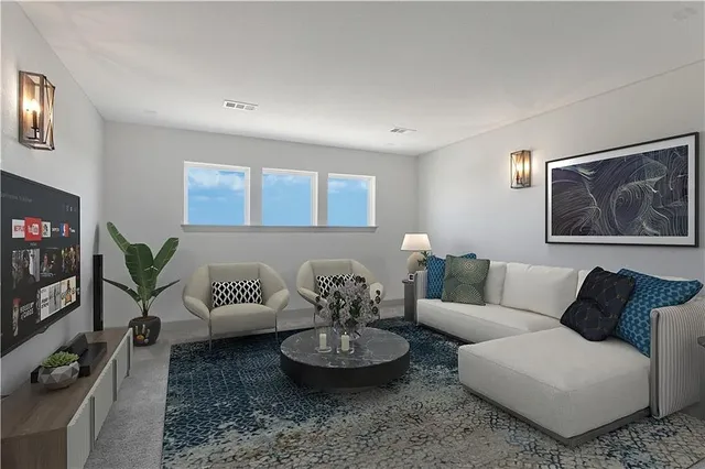 a bathroom with a sink mirror and toilet