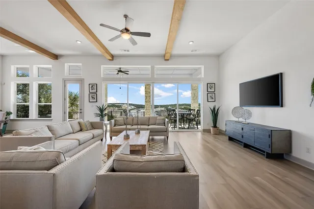 a kitchen with lots of counter top space and living room