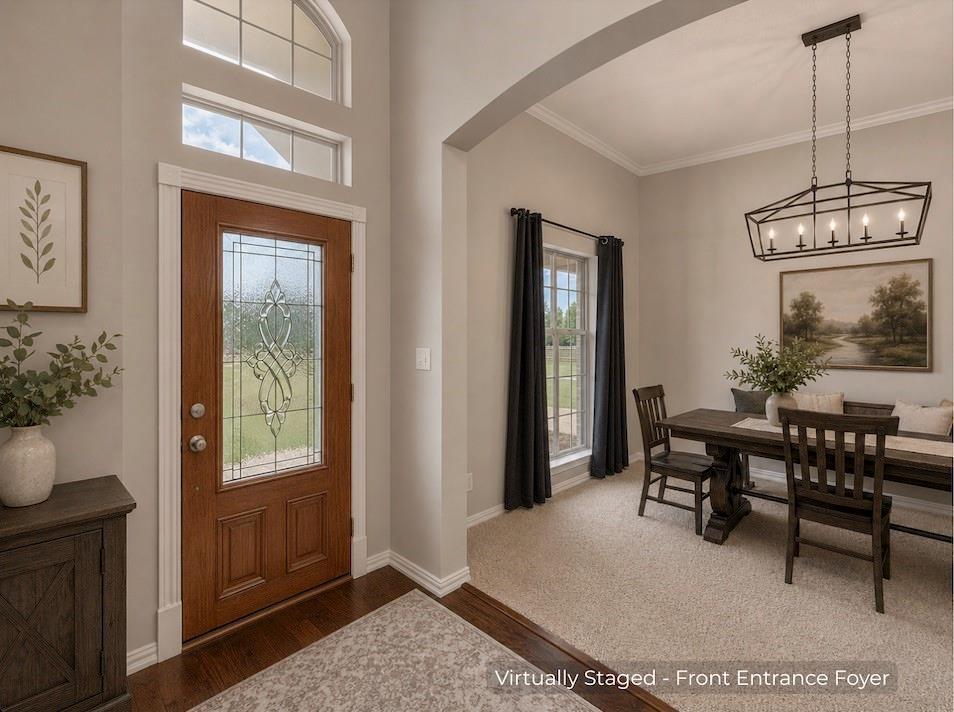 15 Trail Ridge Drive Melissa, TX 75454 - Photo 8 of 38 Rich wood-finish entry door with decorative glass inserts, complemented by transom windows and an arched window above