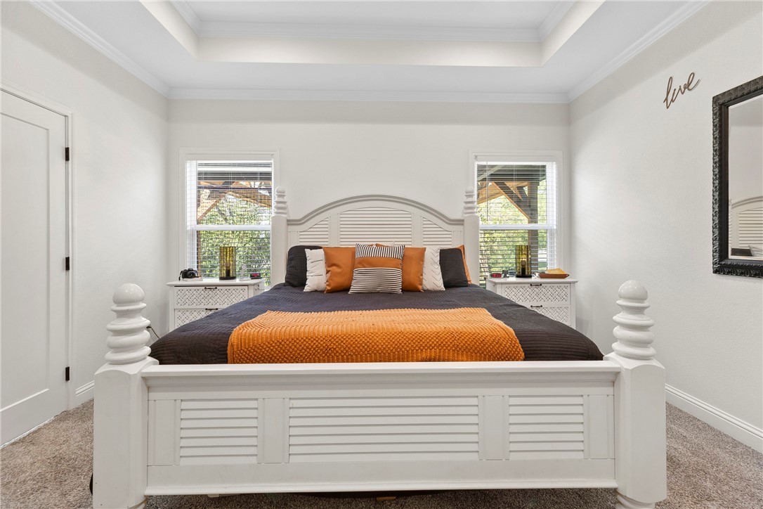 906 3rd Street Valley Mills, TX 76689 - Photo 26 of 52 a bed sitting in a bedroom next to a window