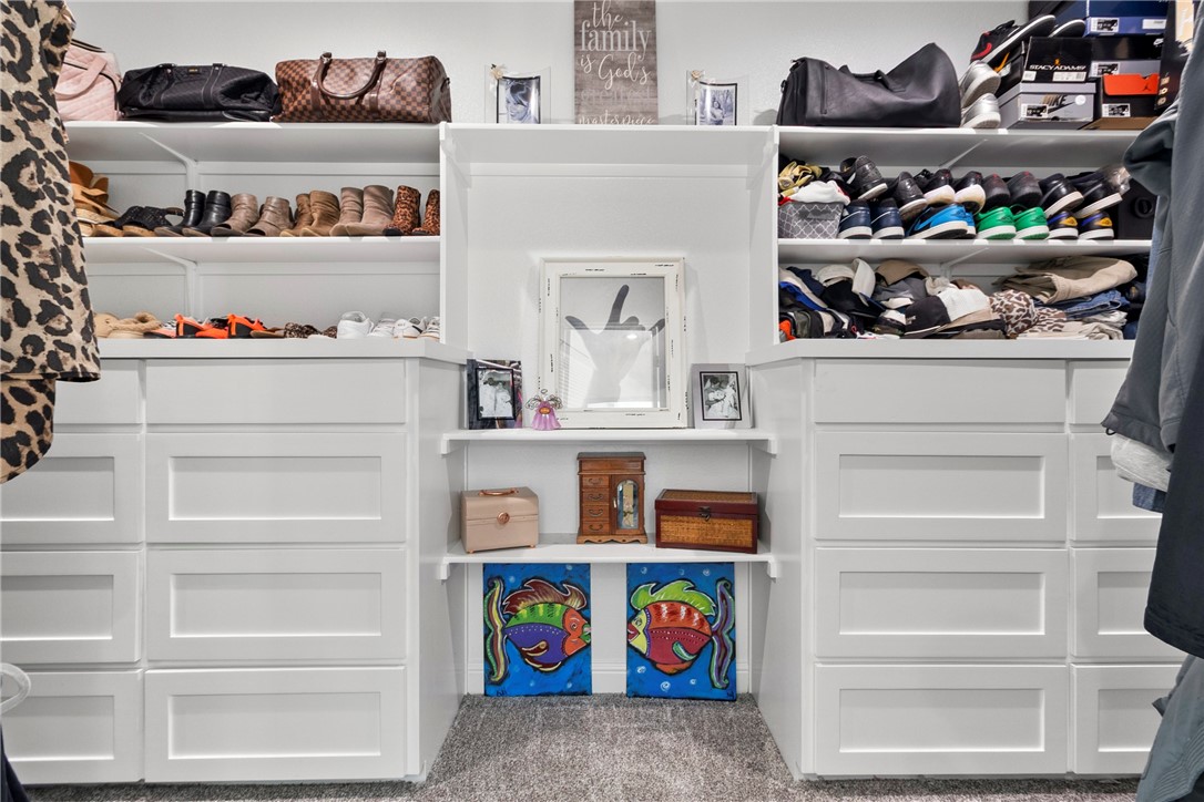 906 3rd Street Valley Mills, TX 76689 - Photo 29 of 52 a view of walk in closet with clothes and shoes