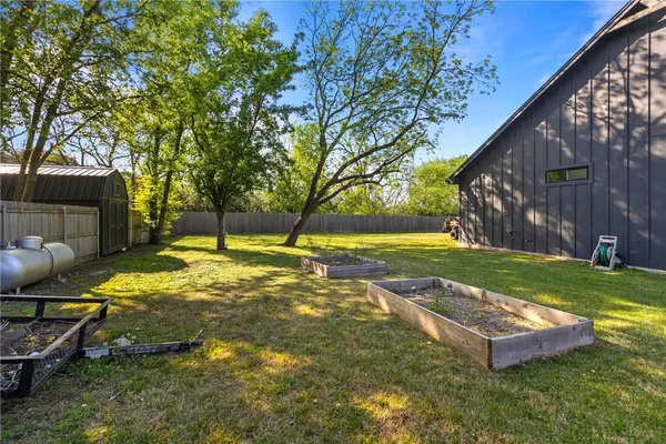 a view of a house with a big yard