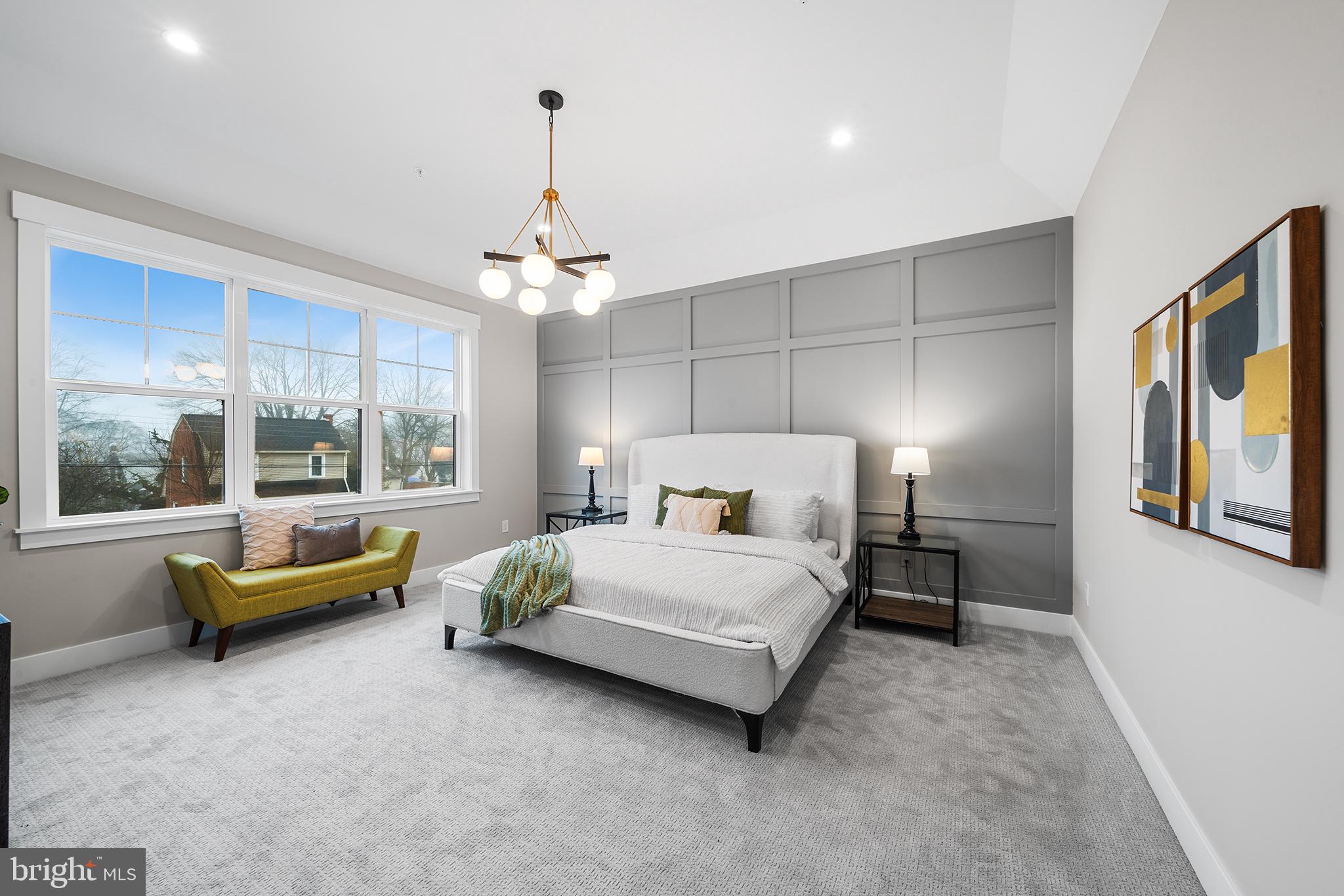 218 Hendricks Avenue Exton, PA 19341 - Photo 17 of 33 a spacious bedroom with a bed and a chandelier