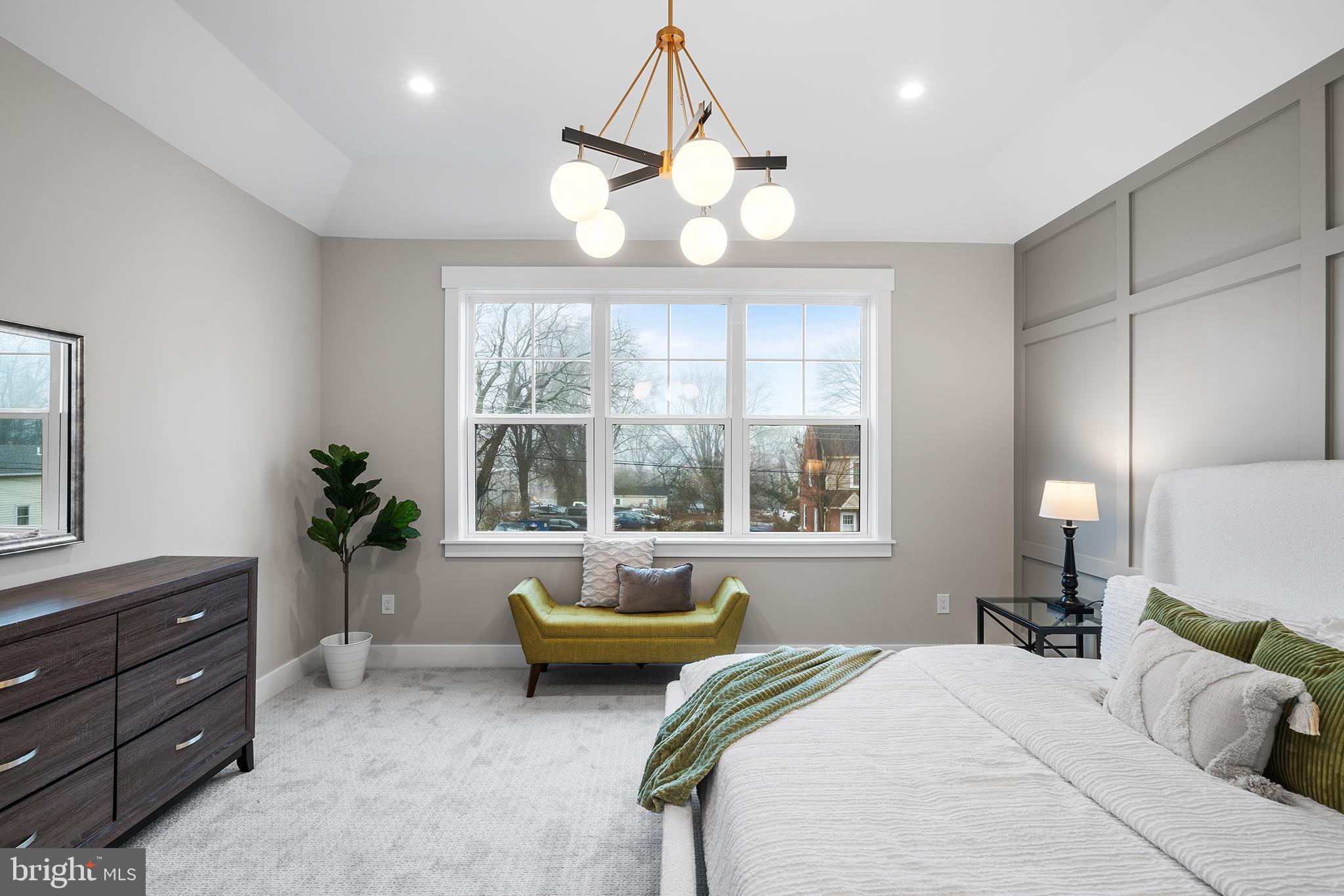 218 Hendricks Avenue Exton, PA 19341 - Photo 18 of 33 a spacious bedroom with a bed and a chandelier
