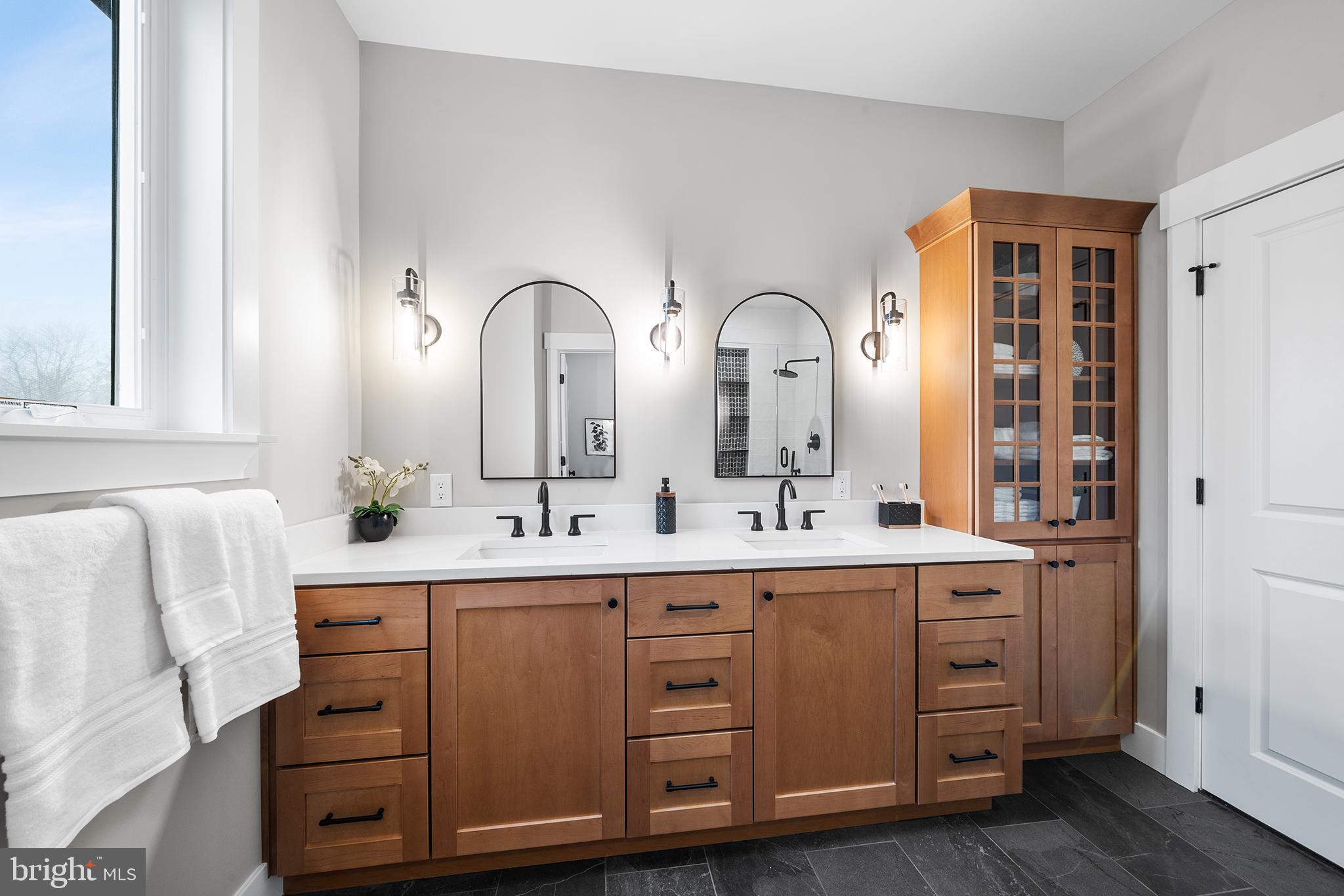 218 Hendricks Avenue Exton, PA 19341 - Photo 19 of 33 a bathroom with a double vanity sink and mirror