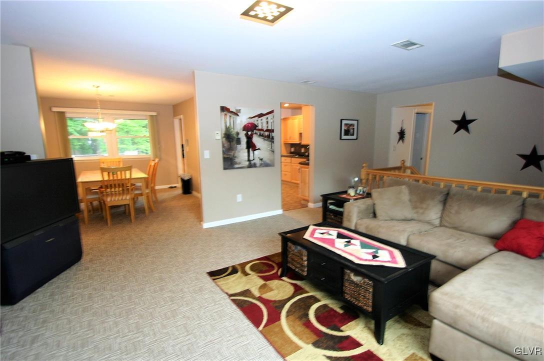 4210 Wellesley Road Bethlehem, PA 18017 - Photo 8 of 44 Living Room opens to the dining room.