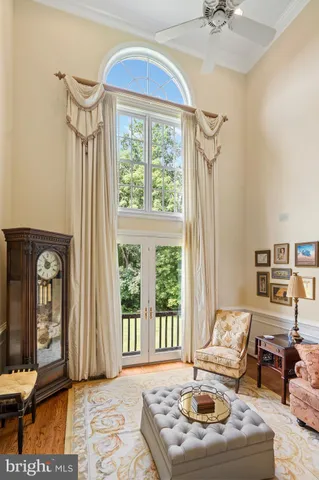 a kitchen with stainless steel appliances granite countertop a stove a sink dishwasher and cabinets with wooden floor