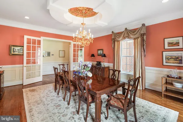 a kitchen with a stove a sink and a refrigerator