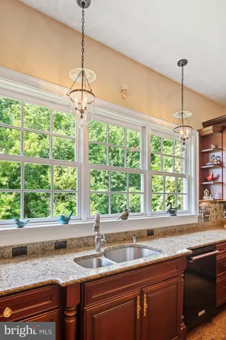 a view of a hallway with seating area