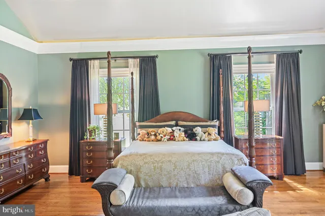a bathroom with a sink toilet and a mirror