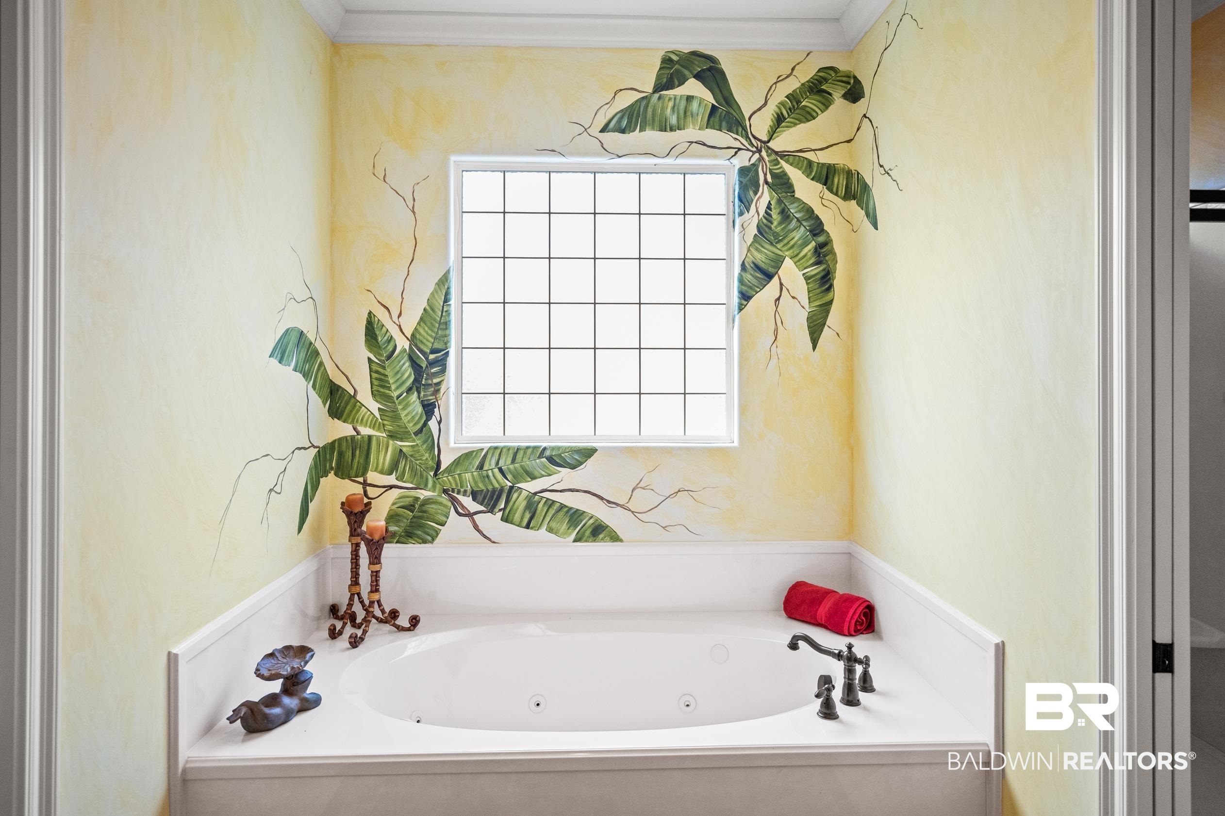 404 Peninsula Boulevard Gulf Shores, AL 36542 - Photo 18 of 51 Full bathroom featuring plenty of natural light and a whirlpool tub