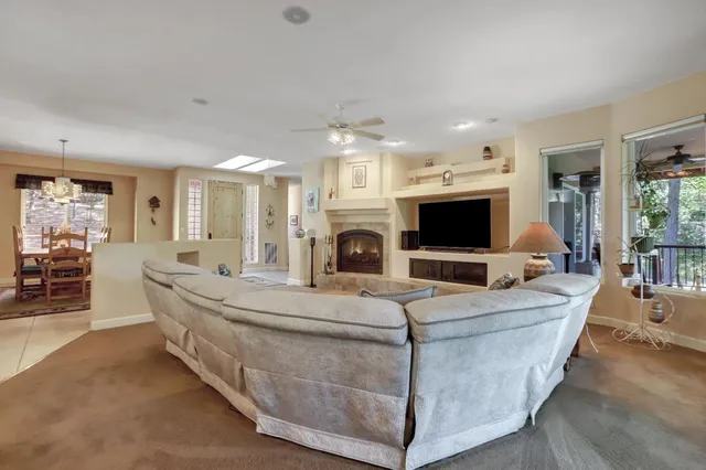 a kitchen with kitchen island granite countertop a sink and counter top space