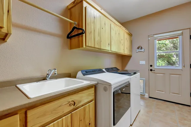 a view of a chairs and table in a patio