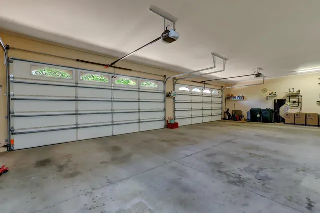 a view of a backyard with large trees