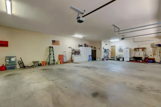 a view of a backyard with large trees