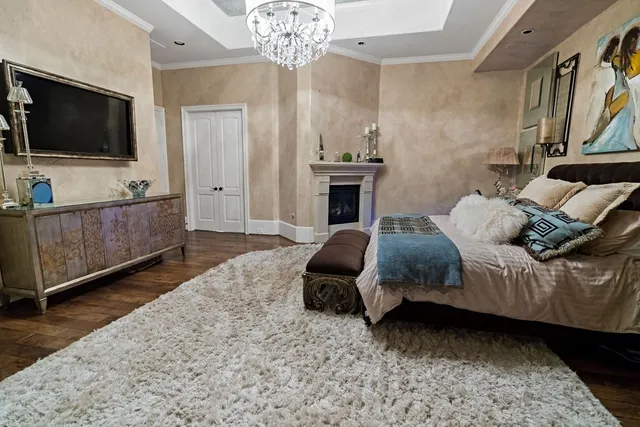a living room with stainless steel appliances kitchen island granite countertop furniture a rug and a window
