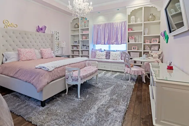 a room with pool table and windows