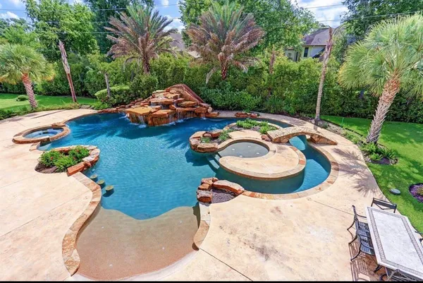 a kitchen with a sink and a fireplace