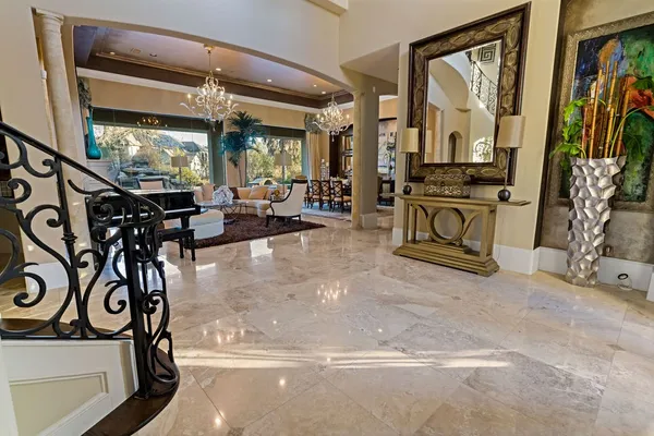 a view of a livingroom with furniture and a window