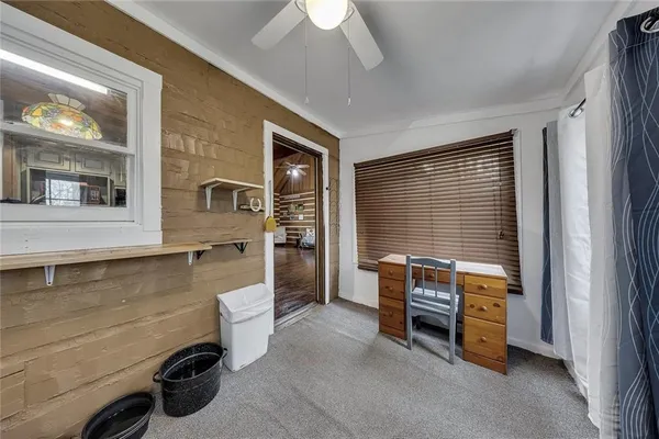 a room with furniture and window