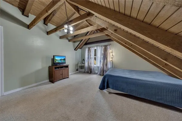 a view of a hallway with stairs
