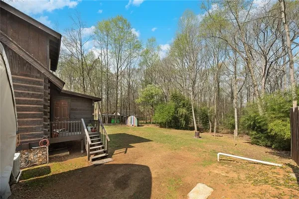 a view of a street with a building in the background