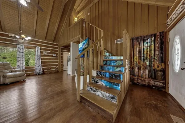 a view of entryway with wooden floor