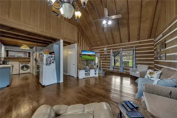 a view of livingroom with furniture and window