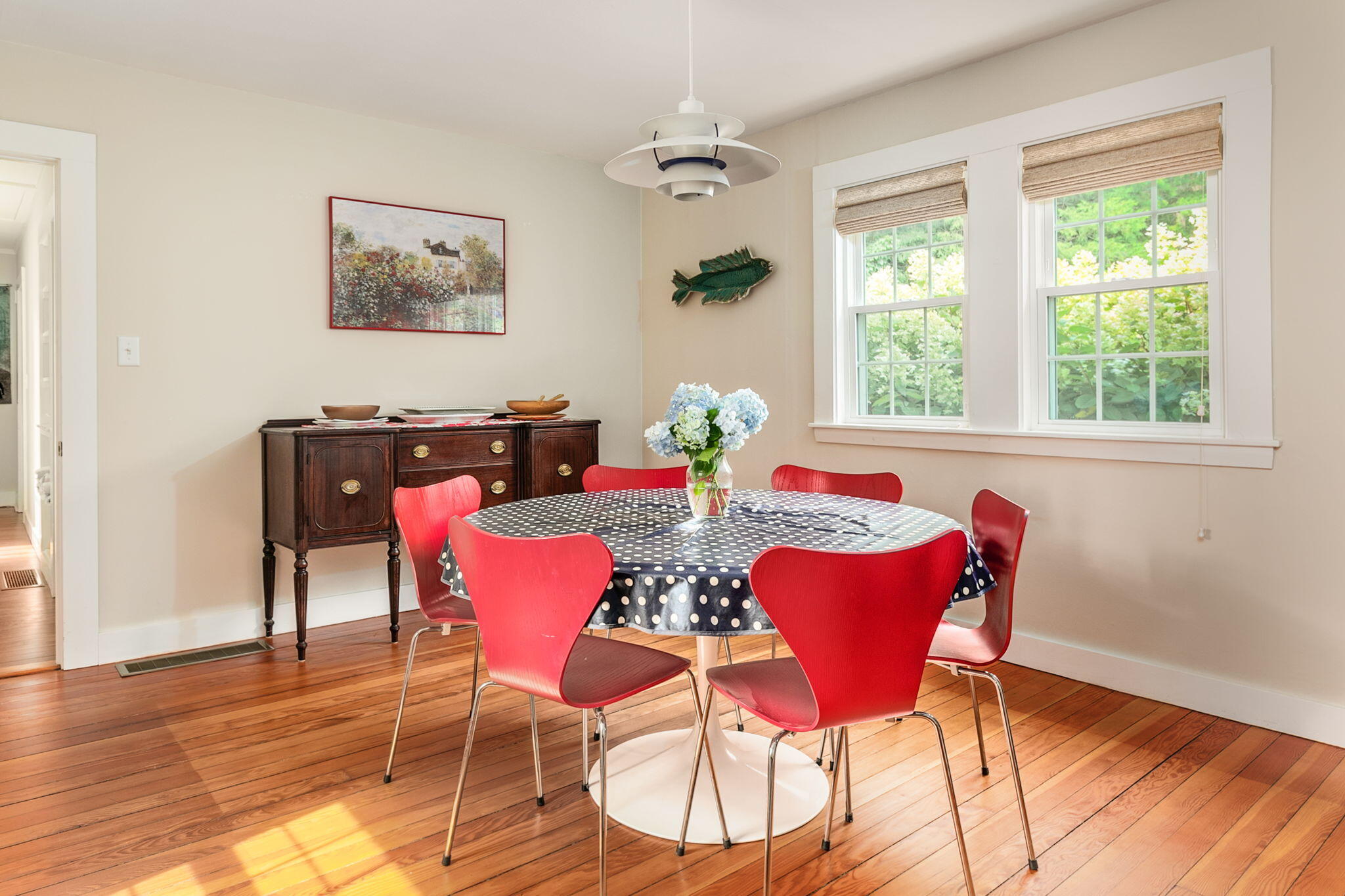 311 Main Street Centerville, MA 02632 - Photo 16 of 45 a view of a dining room with furniture and wooden floor