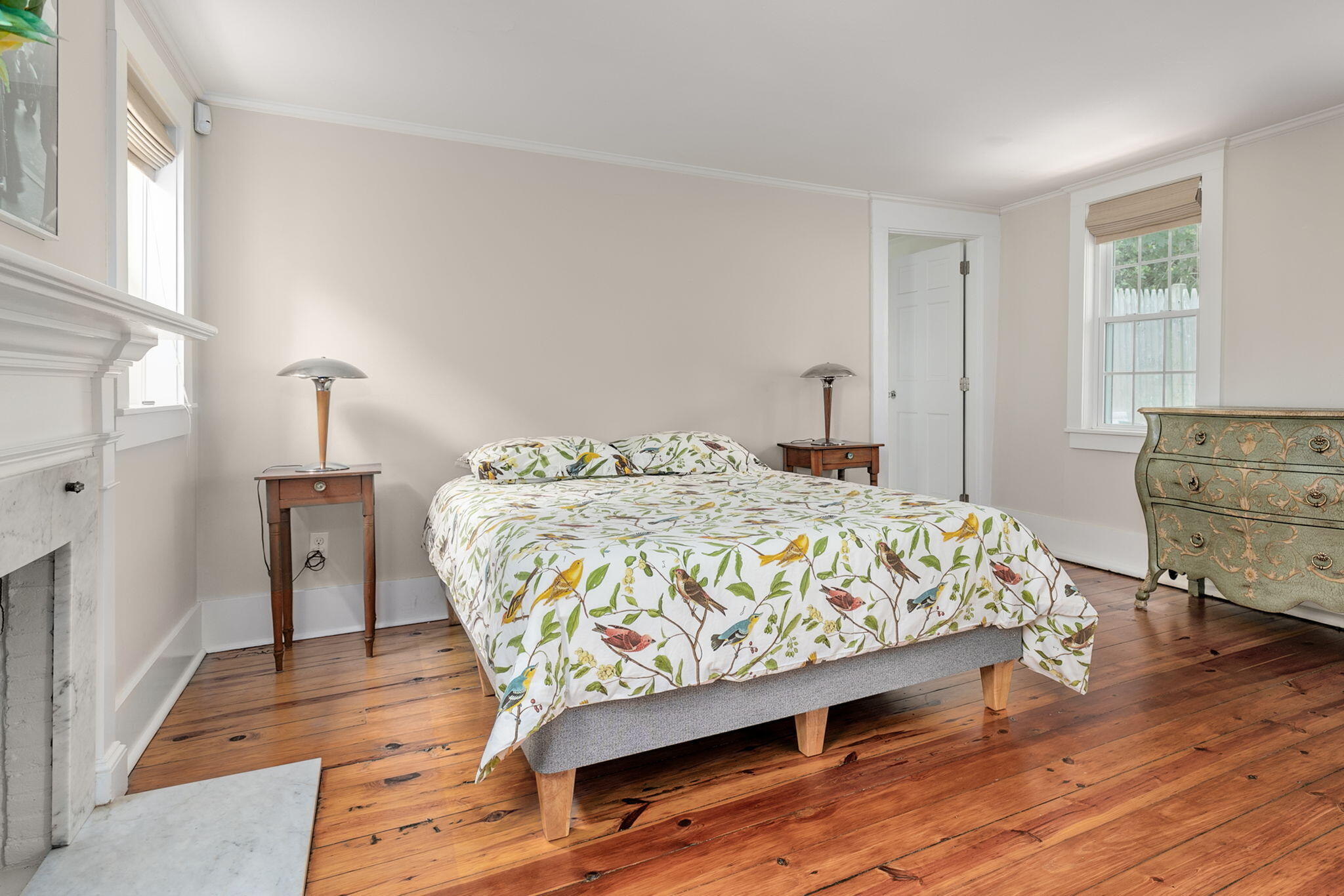 311 Main Street Centerville, MA 02632 - Photo 17 of 45 a bedroom with a bed and wooden floor