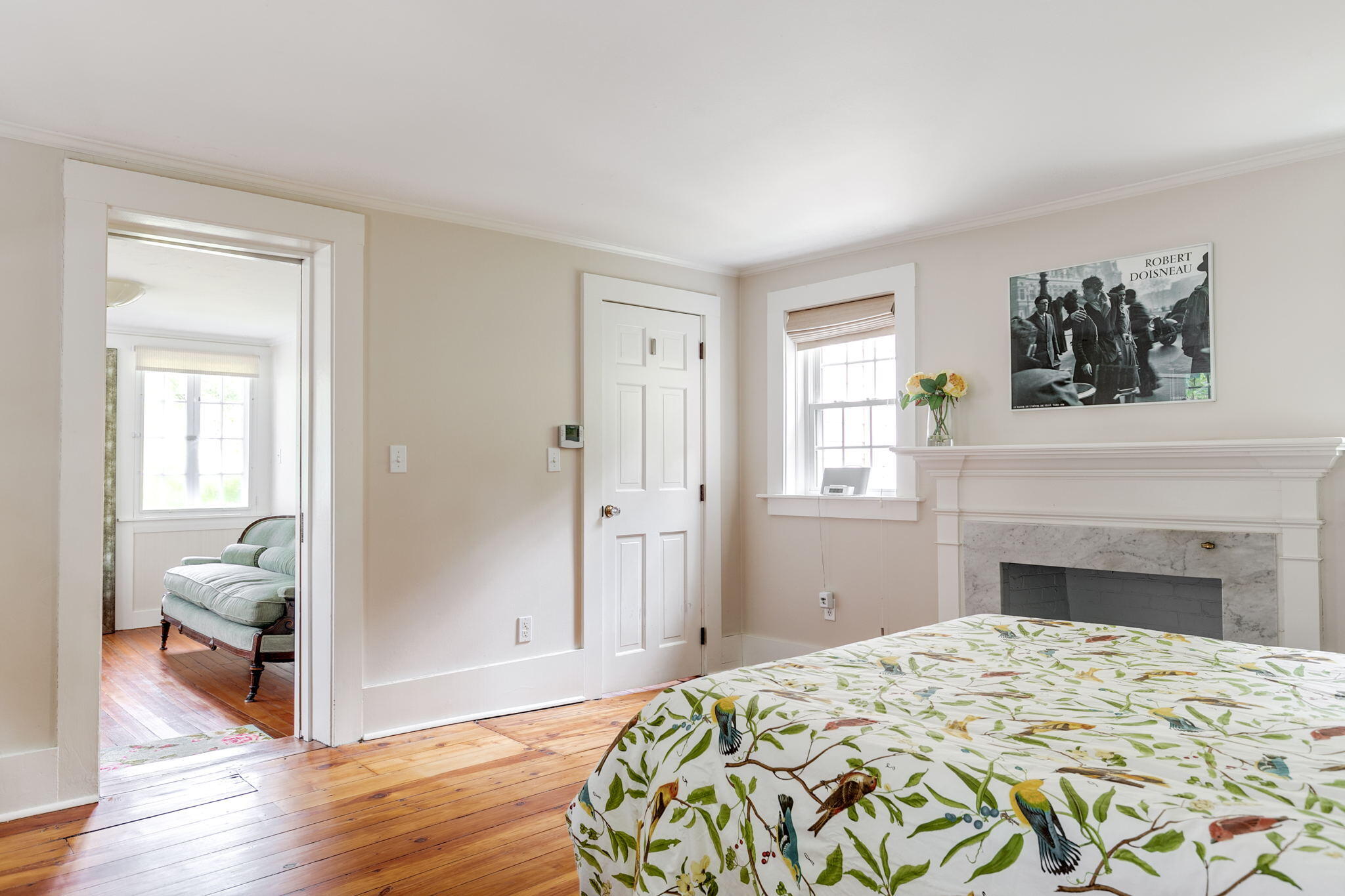 311 Main Street Centerville, MA 02632 - Photo 18 of 45 a bedroom with a bed and a fireplace