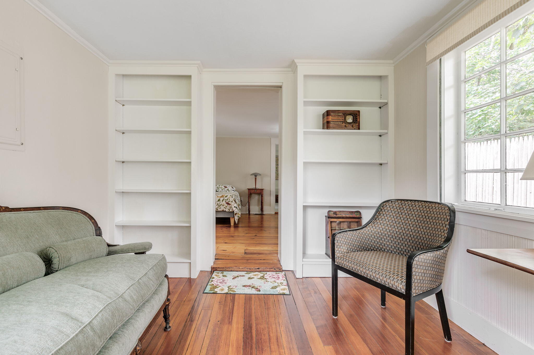 311 Main Street Centerville, MA 02632 - Photo 19 of 45 a living room with furniture and a wooden floor