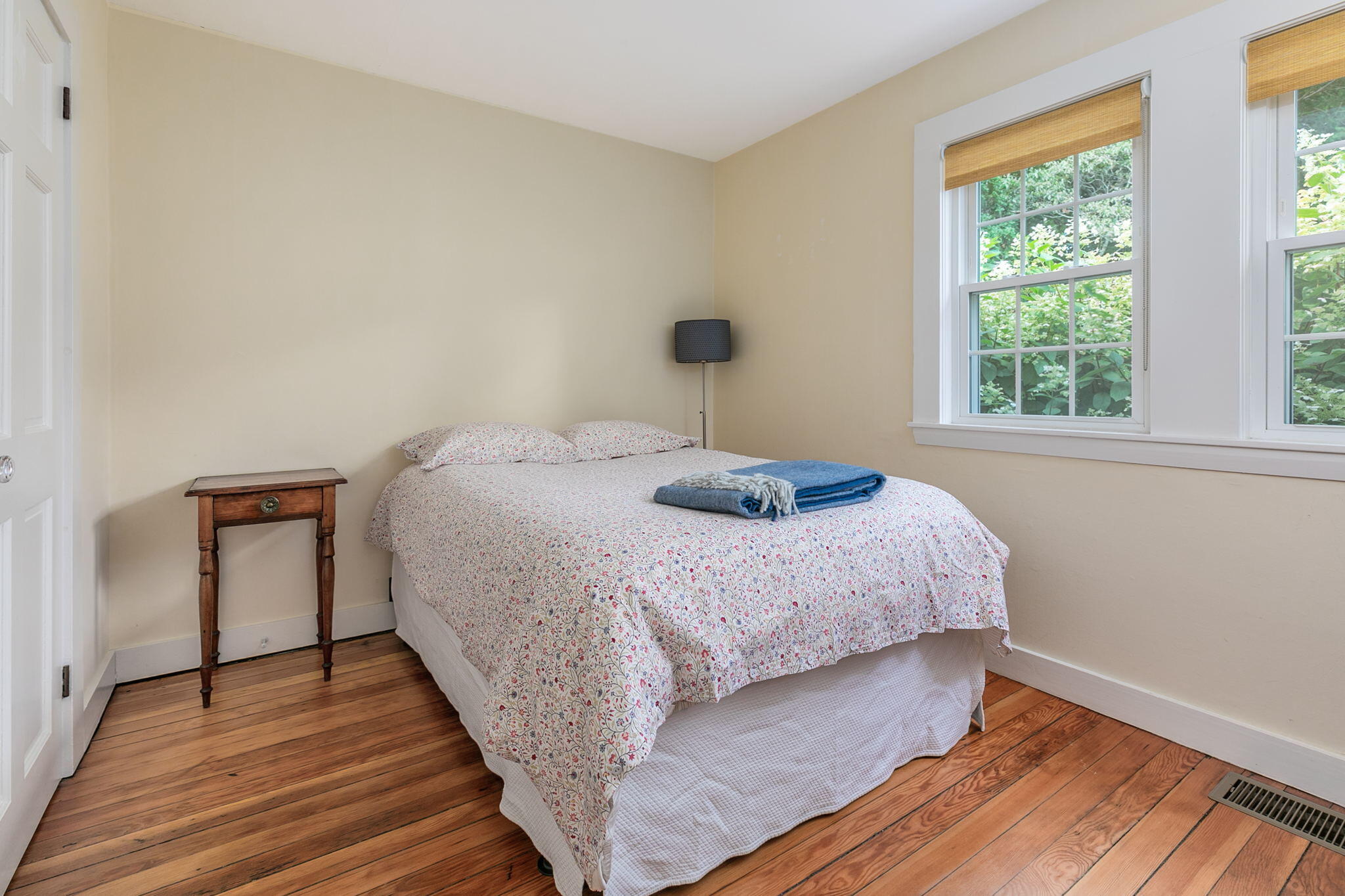 311 Main Street Centerville, MA 02632 - Photo 27 of 45 a bedroom with a bed and wooden floor