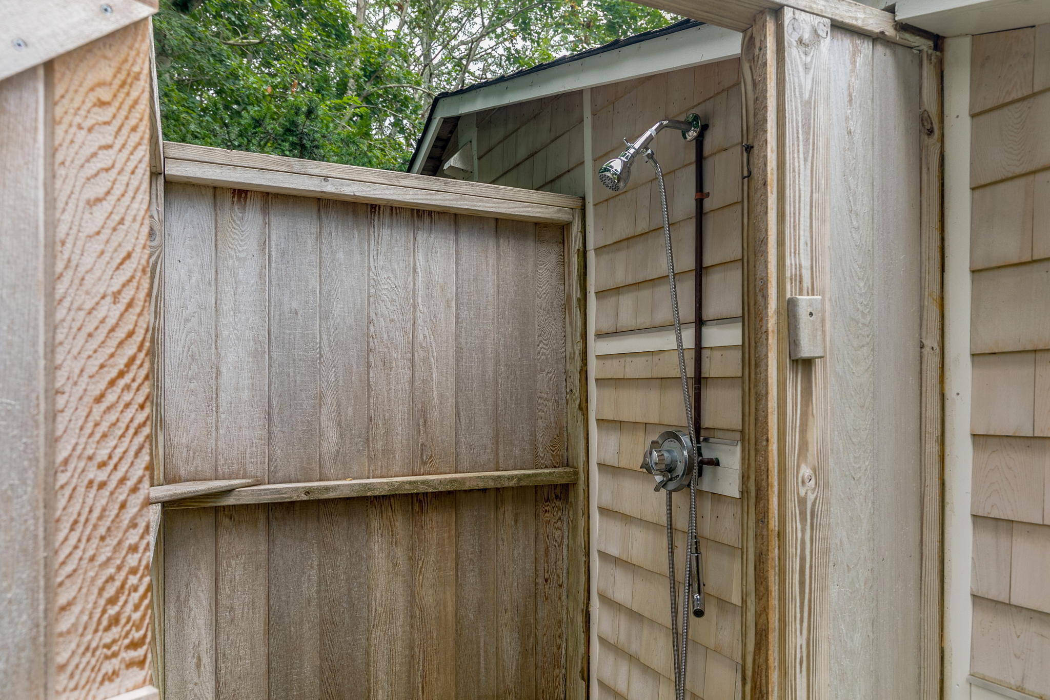 311 Main Street Centerville, MA 02632 - Photo 38 of 45 a view of a house with a wooden door