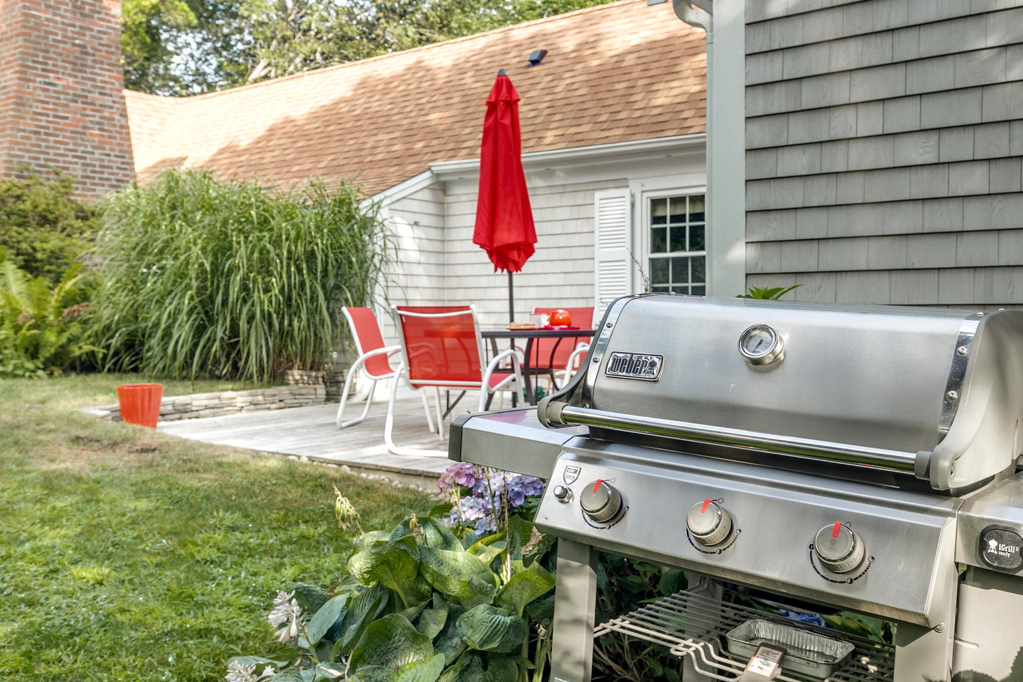 311 Main Street Centerville, MA 02632 - Photo 45 of 45 a view of a room with chairs and a grill
